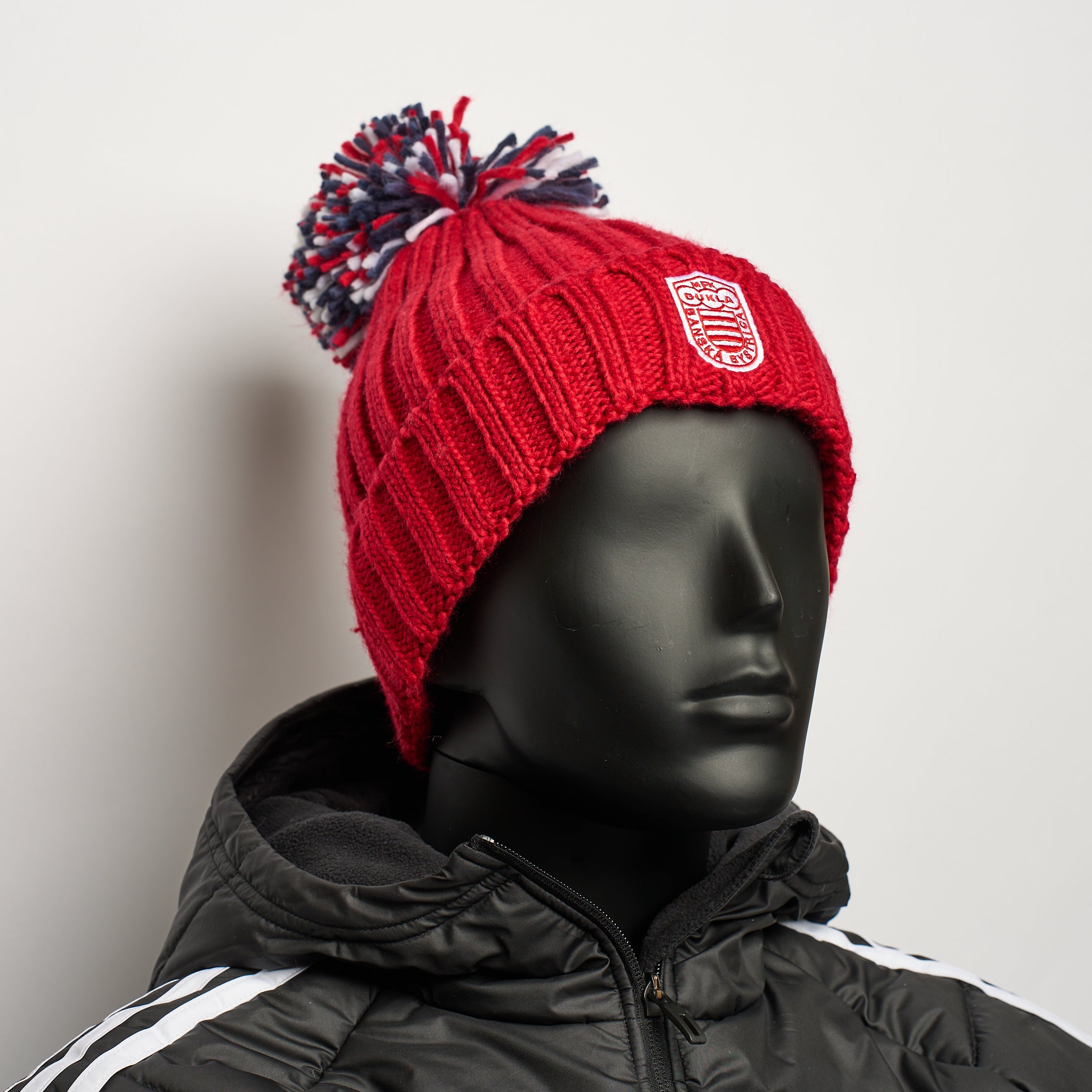 Čiapka zimná hrubá červená s farebným brmbolcom